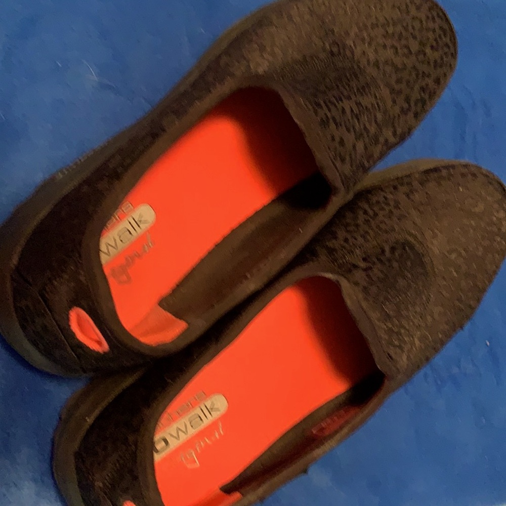 Sketchers black print Go Walk slip one.